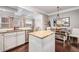 Bright kitchen with granite countertops that opens up to a dining and living area at 3557 Ashcroft Se Dr, Smyrna, GA 30080