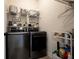 Well-organized laundry room with front-load machines and wire shelving at 3557 Ashcroft Se Dr, Smyrna, GA 30080
