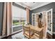 Charming home office featuring french doors, a work desk, and a window offering natural light at 3557 Ashcroft Se Dr, Smyrna, GA 30080