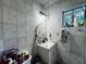 Cozy bathroom with stylish mirror and sink, creating a functional and inviting space at 3356 Hollow Ct, Lawrenceville, GA 30044