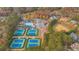 Bird's eye view shows community amenities including the pool, tennis courts, and baseball field at 583 Carl Sanders Dr, Acworth, GA 30101