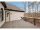 Back of the house, screened porch and elevated deck overlooking wooded backyard at 583 Carl Sanders Dr, Acworth, GA 30101