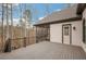 Elevated deck and screened porch overlooking the wooded backyard at 583 Carl Sanders Dr, Acworth, GA 30101