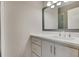 Bathroom vanity with a large mirror, quartz countertop, and modern fixtures at 583 Carl Sanders Dr, Acworth, GA 30101