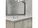 Bathroom vanity featuring a quartz countertop, a large mirror, and modern fixtures at 583 Carl Sanders Dr, Acworth, GA 30101