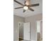 Bedroom featuring a ceiling fan and access to an en-suite bathroom at 583 Carl Sanders Dr, Acworth, GA 30101