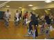 Group fitness class underway with multiple attendees on stationary bicycles in a mirrored studio at 583 Carl Sanders Dr, Acworth, GA 30101