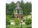 Outdoor gazebo situated in a beautifully landscaped garden setting at 583 Carl Sanders Dr, Acworth, GA 30101