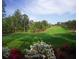 Scenic golf course with lush green fairway and a variety of trees, creating a picturesque landscape at 583 Carl Sanders Dr, Acworth, GA 30101
