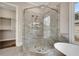 Elegant shower with detailed stone, tile work, and custom hardware at 583 Carl Sanders Dr, Acworth, GA 30101