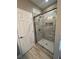 Modern bathroom featuring a shower with new tile work and a glass door at 183 Brookwood Xing, Douglasville, GA 30134
