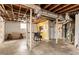 Unfinished basement with concrete floors and exposed ceiling beams, ready for customization and personalization at 1031 Dogwood Pl, Marietta, GA 30062