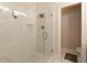 Clean bathroom featuring a glass-enclosed shower with marble accents and modern fixtures at 1950 Buford Dam Rd # 105, Cumming, GA 30041
