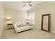 Serene bedroom with a ceiling fan, large mirror, and calm decor for a restful retreat at 1950 Buford Dam Rd # 105, Cumming, GA 30041