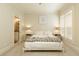 Calm bedroom with a ceiling fan, shuttered windows, and calming decor; bathroom access at 1950 Buford Dam Rd # 105, Cumming, GA 30041