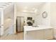 Kitchen featuring stainless steel appliances, a kitchen island, and hardwood floors at 1950 Buford Dam Rd # 105, Cumming, GA 30041