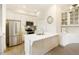 Kitchen boasting stainless steel appliances, a kitchen island, and granite countertops at 1950 Buford Dam Rd # 105, Cumming, GA 30041