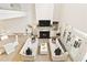 Bright, airy living room with a fireplace, and soaring ceilings that create a spacious and inviting atmosphere at 1950 Buford Dam Rd # 105, Cumming, GA 30041
