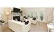 Bright living room with fireplace and french doors to the backyard at 1950 Buford Dam Rd # 105, Cumming, GA 30041