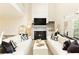 Bright living room with fireplace and french doors to the backyard at 1950 Buford Dam Rd # 105, Cumming, GA 30041