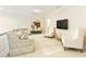 Cozy loft features neutral tones, plush seating, and mounted television, creating a relaxing retreat at 1950 Buford Dam Rd # 105, Cumming, GA 30041