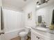 Standard bathroom featuring a shower-tub combo, toilet, and white vanity at 397 Nolan Se St, Atlanta, GA 30315