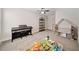 Spacious bedroom/playroom featuring ample space, a piano, and ' toys at 8007 Wishaw Ct, Winston, GA 30187