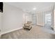 Versatile bonus room with neutral carpet, ready for your personal touch and design at 8007 Wishaw Ct, Winston, GA 30187