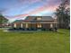 Charming one-story home with a large front lawn and covered porch at 8007 Wishaw Ct, Winston, GA 30187