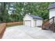 Detached garage with new driveway and ample parking space at 257 Birch St, Hapeville, GA 30354