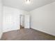 Bedroom with closet, new carpeting, and natural light at 110 Jackson St, Buford, GA 30518