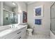 Clean, well-lit bathroom with a modern vanity, and a shower behind glass doors at 1297 Swims Valley Nw Dr, Atlanta, GA 30327