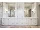 Elegant bathroom with marble countertops, dual sinks, and custom cabinetry at 1297 Swims Valley Nw Dr, Atlanta, GA 30327