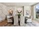 Stylish dining room featuring decorative wallpaper, a modern chandelier, and large windows at 1297 Swims Valley Nw Dr, Atlanta, GA 30327
