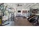 Home gym with treadmills, weight machines, and large mirrors for a complete workout experience at 1297 Swims Valley Nw Dr, Atlanta, GA 30327