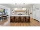 Spacious gourmet kitchen features a large island with bar seating, modern appliances, and stylish lighting at 1297 Swims Valley Nw Dr, Atlanta, GA 30327