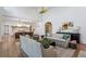 Inviting living room with an open-concept design, seamlessly connected to the gourmet kitchen and dining area at 1297 Swims Valley Nw Dr, Atlanta, GA 30327