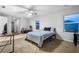 Neutral bedroom with ceiling fan, large windows, and wall-to-wall carpet at 1805 Marcelina Ln, Mcdonough, GA 30253