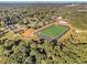 Panoramic aerial view of a sports complex, construction and surrounding wooded neighborhood at 427 S Columbia Dr, Decatur, GA 30030