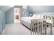 Bright bedroom with plush carpet, neutral walls, and comfortable furnishings, creating a cozy retreat at 427 S Columbia Dr, Decatur, GA 30030