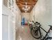 Bright garage featuring storage and bicycles with a textured floor. and finished ceiling at 427 S Columbia Dr, Decatur, GA 30030
