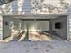 Clean and spacious garage with epoxy floors and good lighting, ideal for parking and storage at 427 S Columbia Dr, Decatur, GA 30030