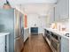 Contemporary kitchen featuring stainless steel appliances and grey shaker style cabinets at 427 S Columbia Dr, Decatur, GA 30030