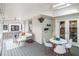 Covered porch featuring comfortable seating, ceiling fans, and views of the surrounding greenery at 427 S Columbia Dr, Decatur, GA 30030