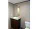 This bathroom features a vanity, a sink, and modern fixtures at 155 Emily Dr, Whitesburg, GA 30185