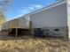 Rear exterior of home, showing deck and HVAC at 155 Emily Dr, Whitesburg, GA 30185