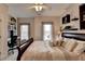 Bedroom with natural light, features built-in bookshelves and a cozy reading nook at 3001 Prestwyck Haven Dr, Duluth, GA 30097