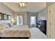 Comfortable bedroom featuring neutral tones, two windows, and plush carpet at 3001 Prestwyck Haven Dr, Duluth, GA 30097