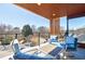 Relaxing outdoor balcony area featuring comfortable seating and an open view of the neighborhood at 1812 Hunters Gln, Marietta, GA 30062