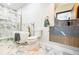 Modern bathroom featuring a soaking tub, marble accents, and a sleek vanity at 1812 Hunters Gln, Marietta, GA 30062
